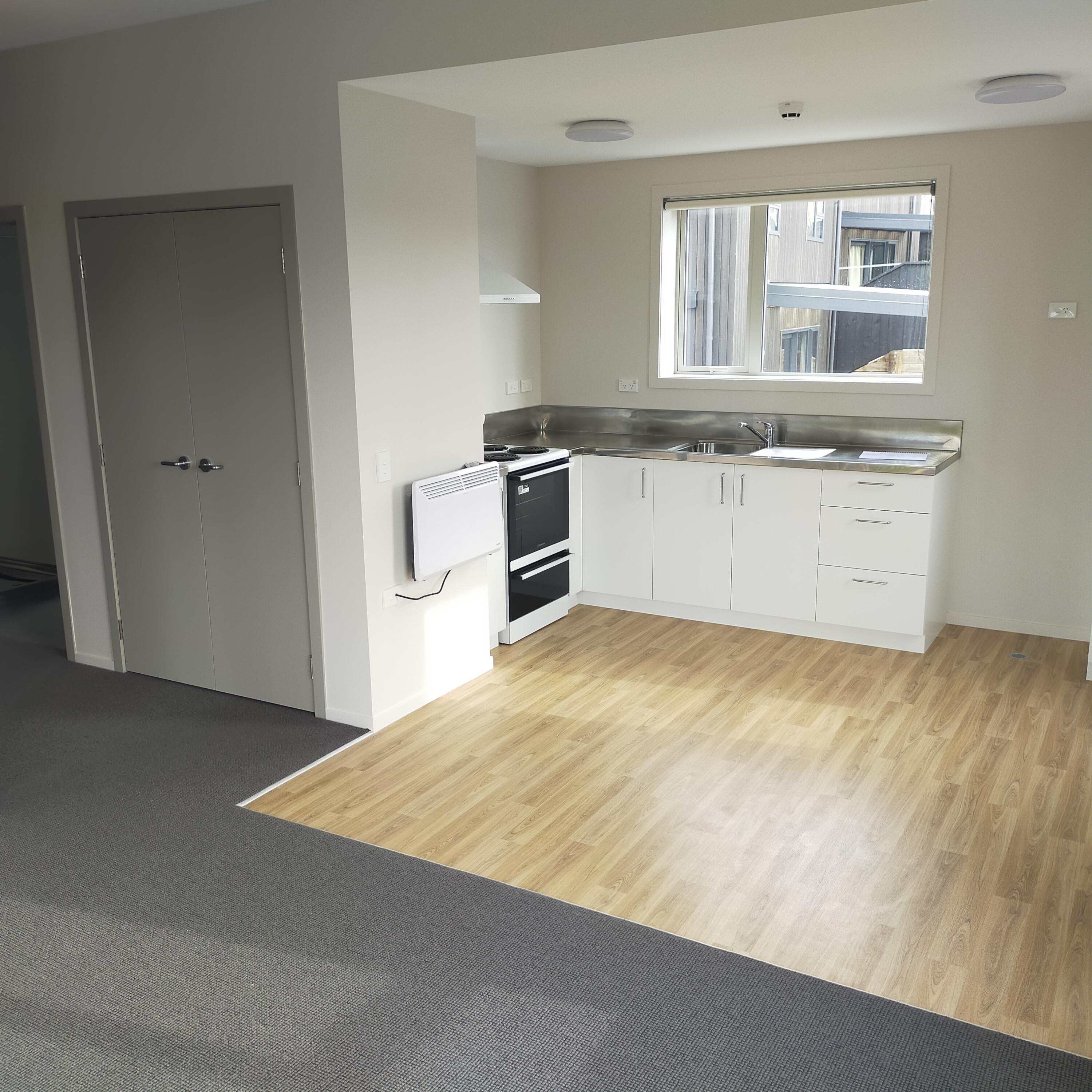 Commercial unit - freshly painted kitchenette with vinyl flooring