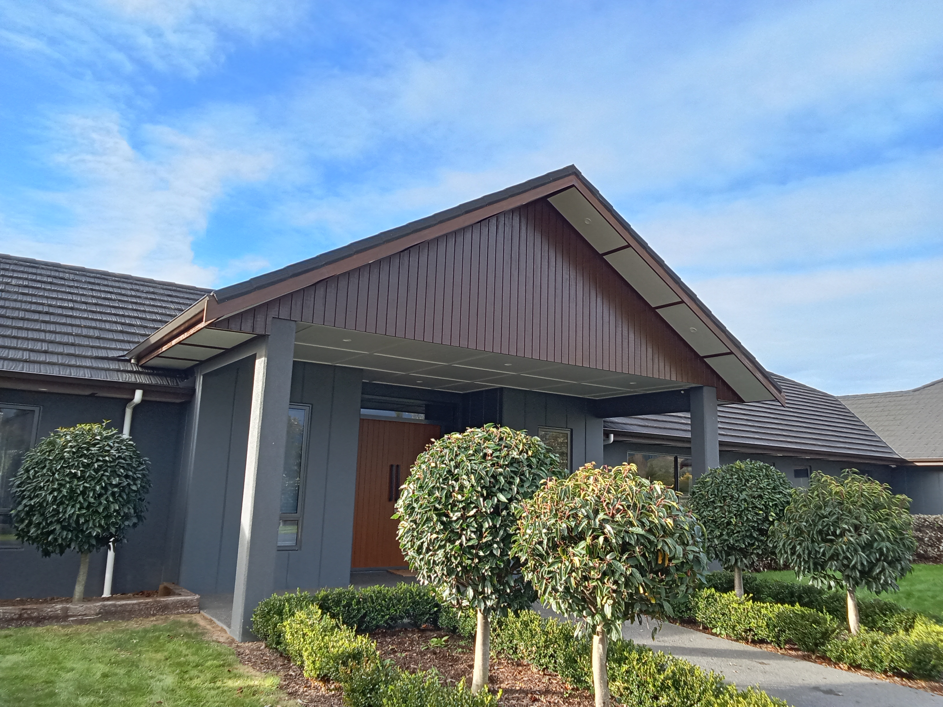 Lifestyle home front entry - cedar gable with timber door