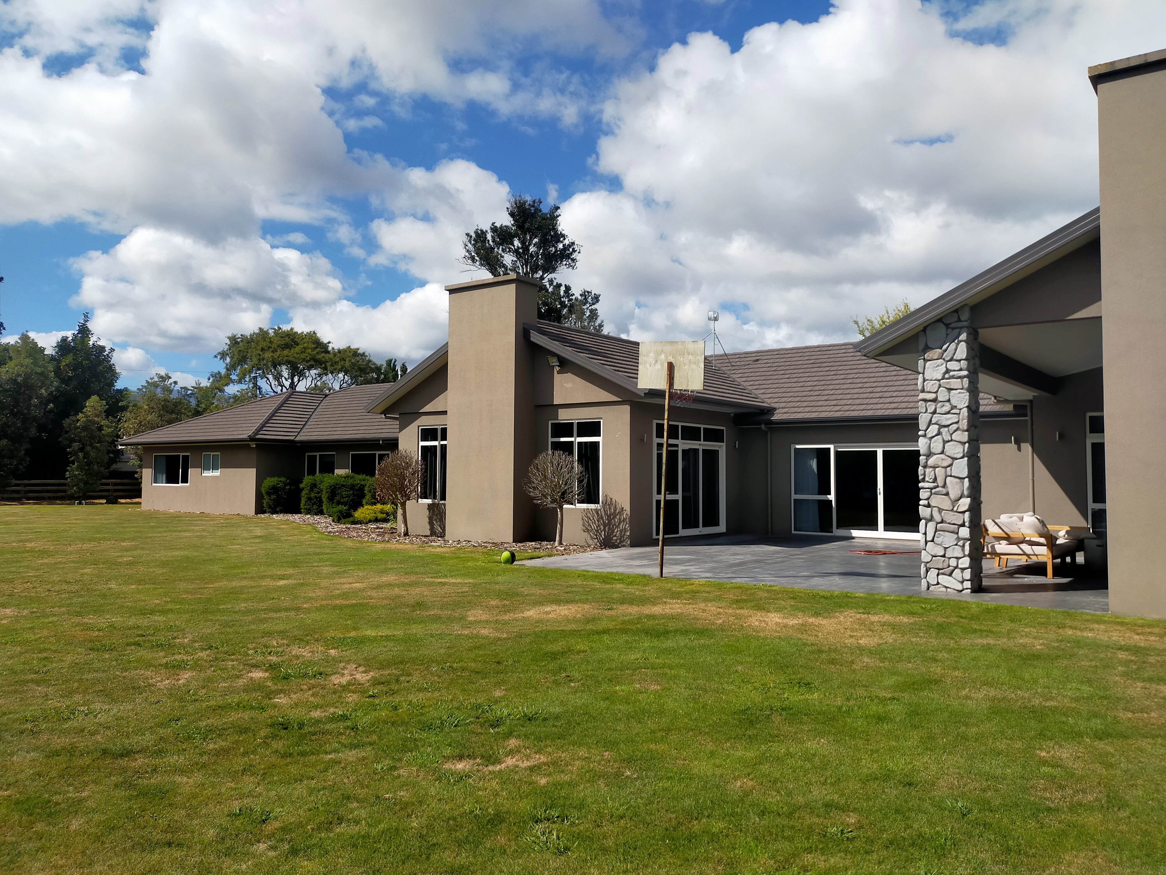 Large rural property - plastered exterior with stone column